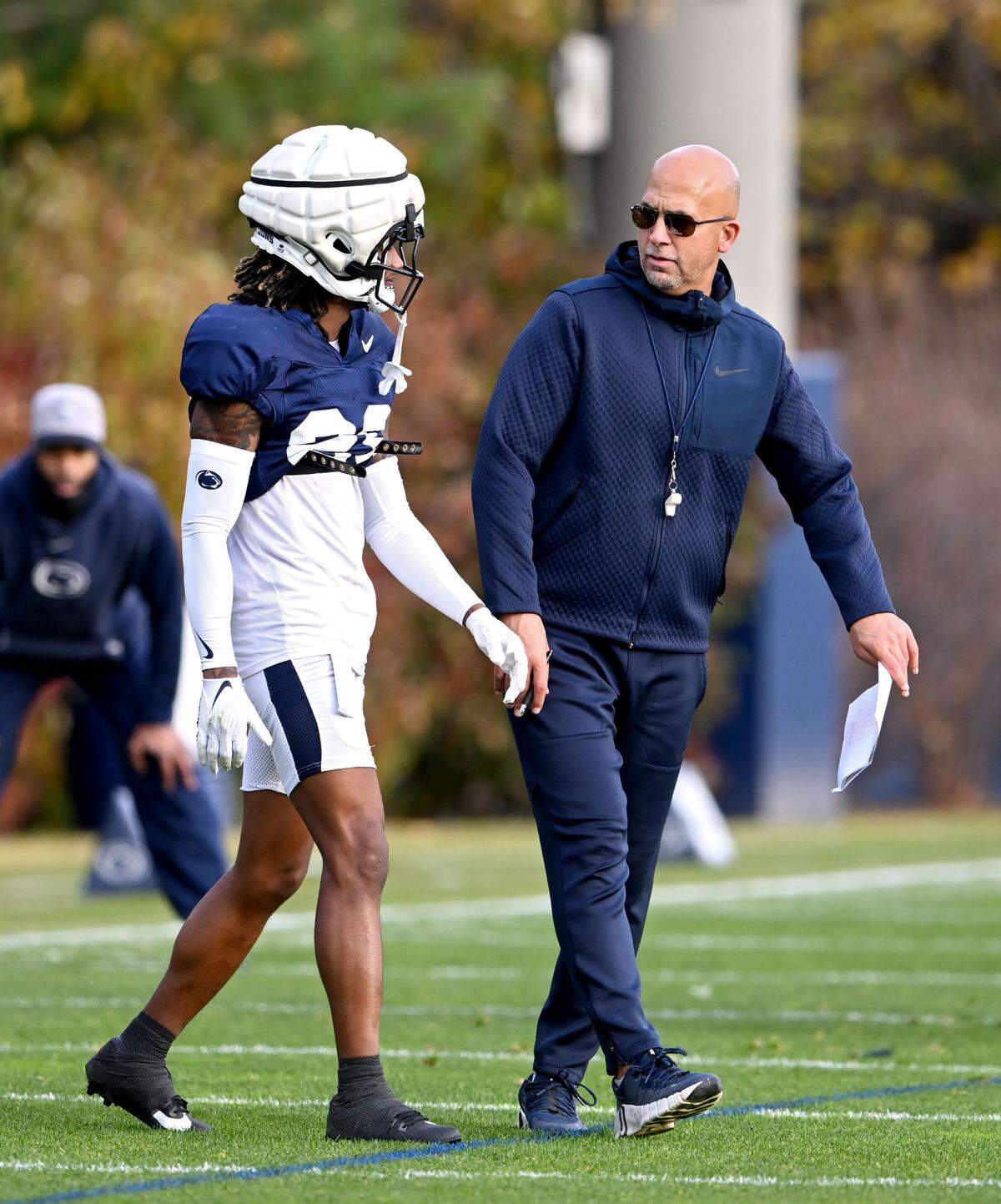 Penn State cornerback Audavion Collins talks with coach James Franklin during practice on Wednesday, Oct. 30, 2024.