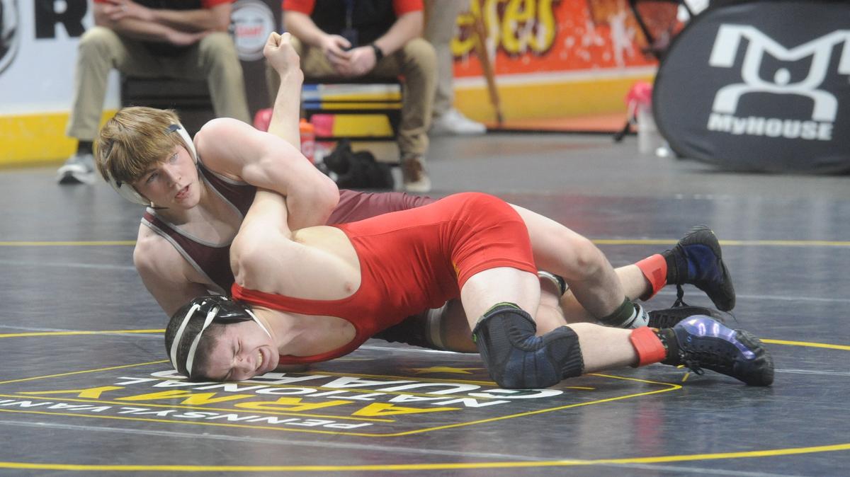 State College’s Asher Cunningham controls West Chester East’s Max Parnis in their 145-pound first round match of the PIAA Class 3A Championships on Thursday, March 9, 2023 at the Giant Center in Hershey. Cunningham beat Parnis, 7-0.