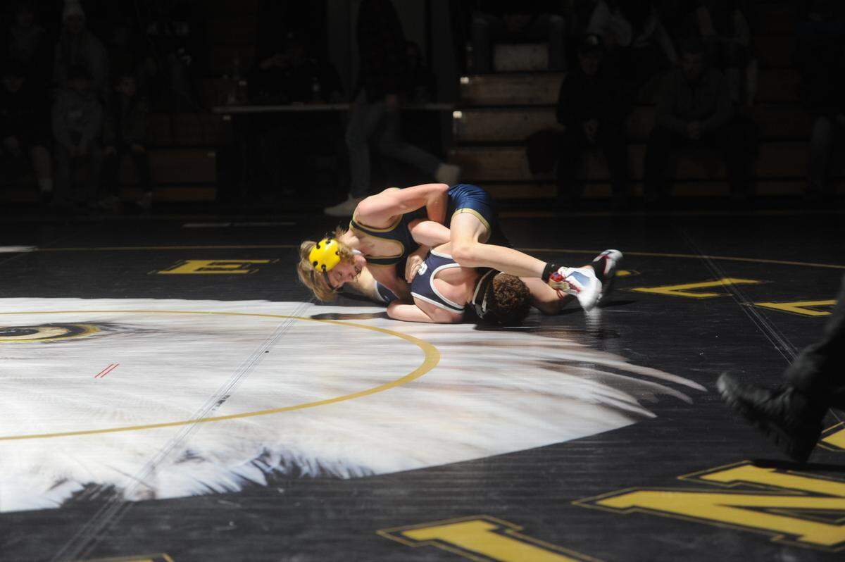 Bald Eagle Area’s Gavin Guenot works on taking Brookville’s Chris Carroll to his back in their 106-pound bout during the Eagles’ 45-23 win on Thursday. Guenot pinned Carroll in 2:35.