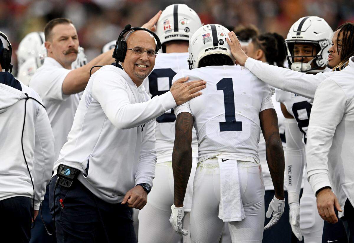 Penn State football coach James Franklin celebrates after a touchdown during the Rose Bowl game against Utah on Monday, Jan. 2, 2023.