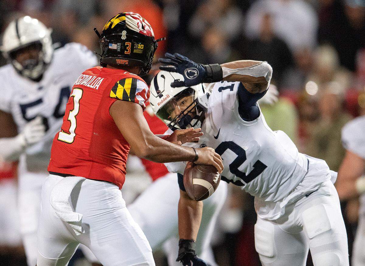 Penn State linebacker Brandon Smith pressures Maryland quarterback Taulia Tagovailoa during the game on Saturday, Nov. 6, 2021.