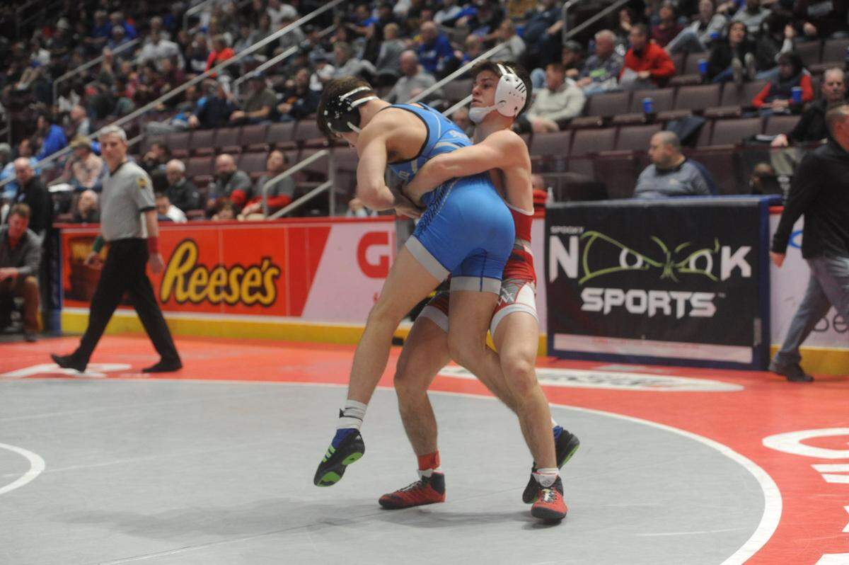 Bellefonte’s Jude Swisher looks to return Hempfield Area’s Lucas Kapusta to the mat in their 145-pound second round match of the PIAA Class 3A Championships on Thursday, March 10, 2022 at Giant Center in Hershey. Swisher topped Kapusta, 4-2, in ultimate tiebreaker No. 2.