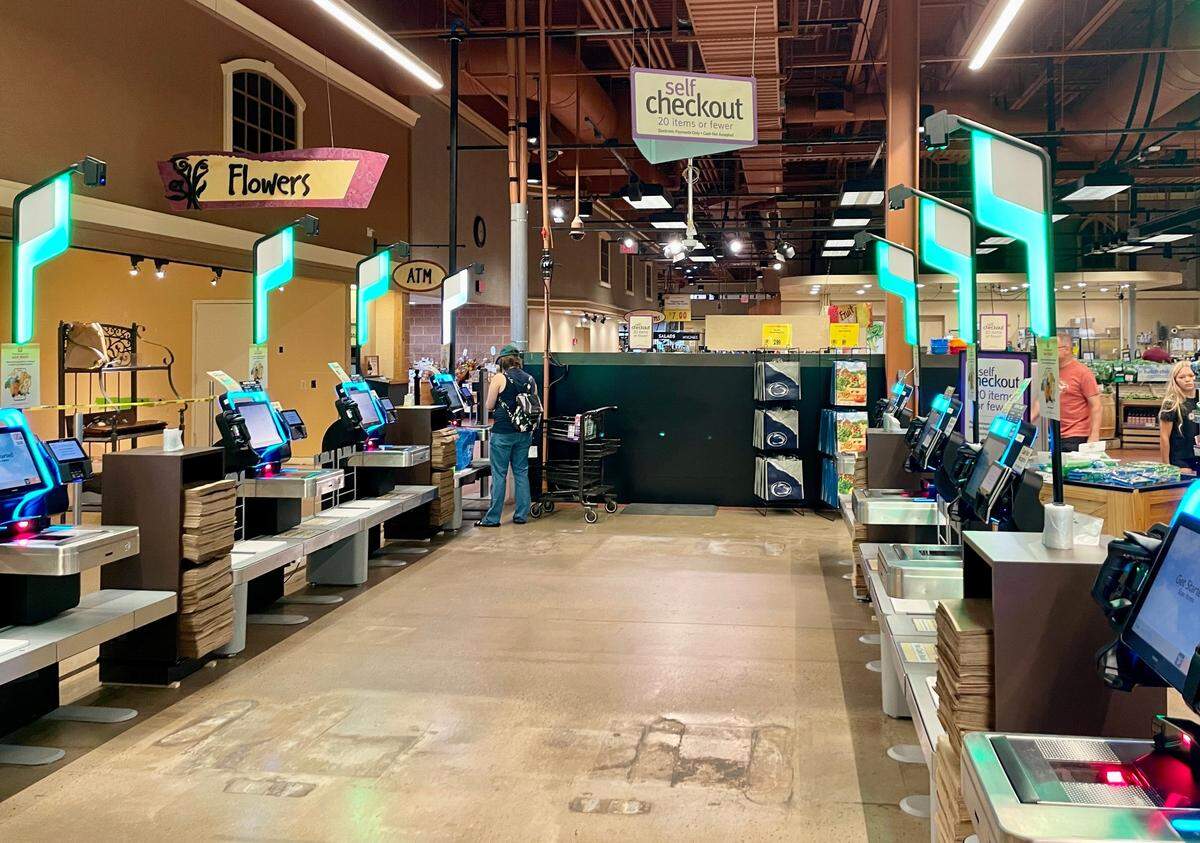 The expanded self-checkout area at State College’s Wegmans now features 10 self-service kiosks.