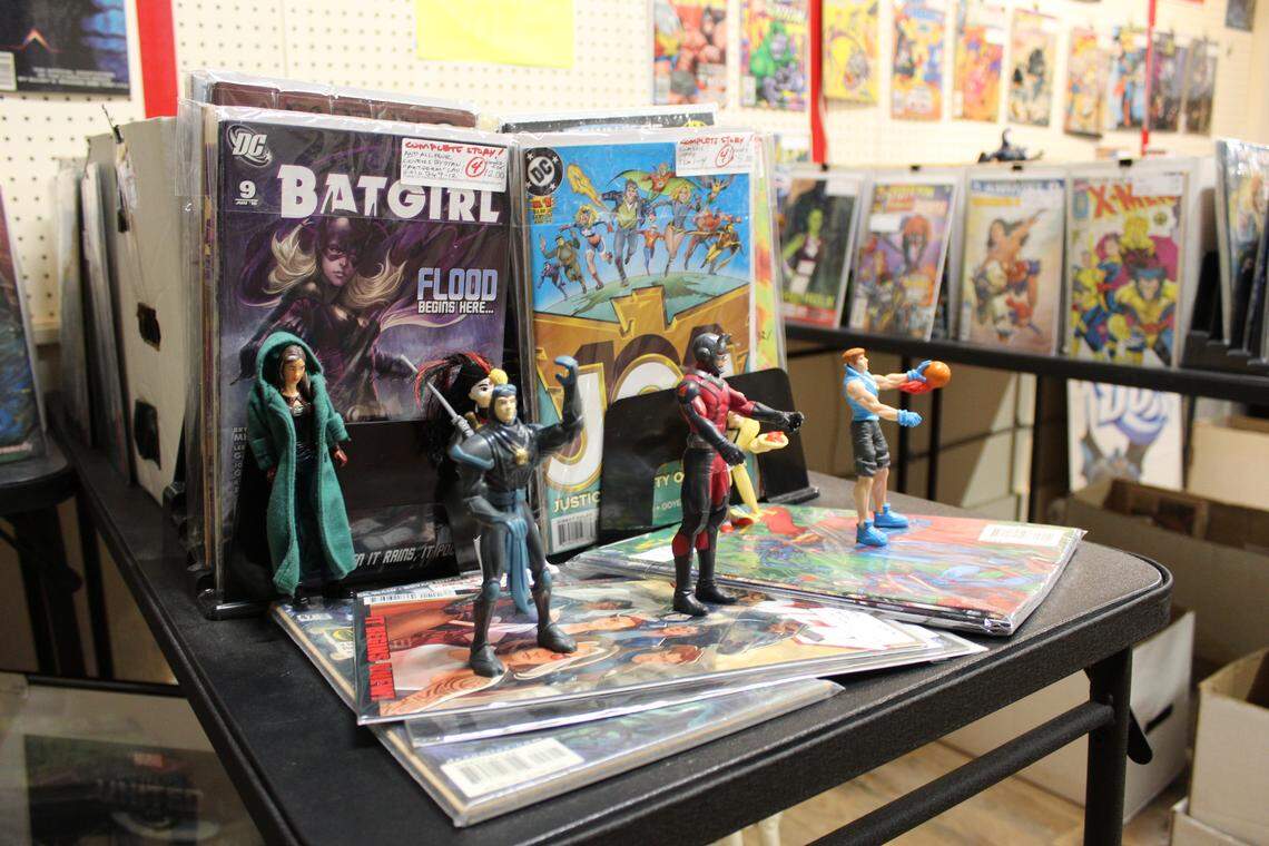 Action figures and comic books for sale at The Great Mish Mosh on March 12, 2026.
