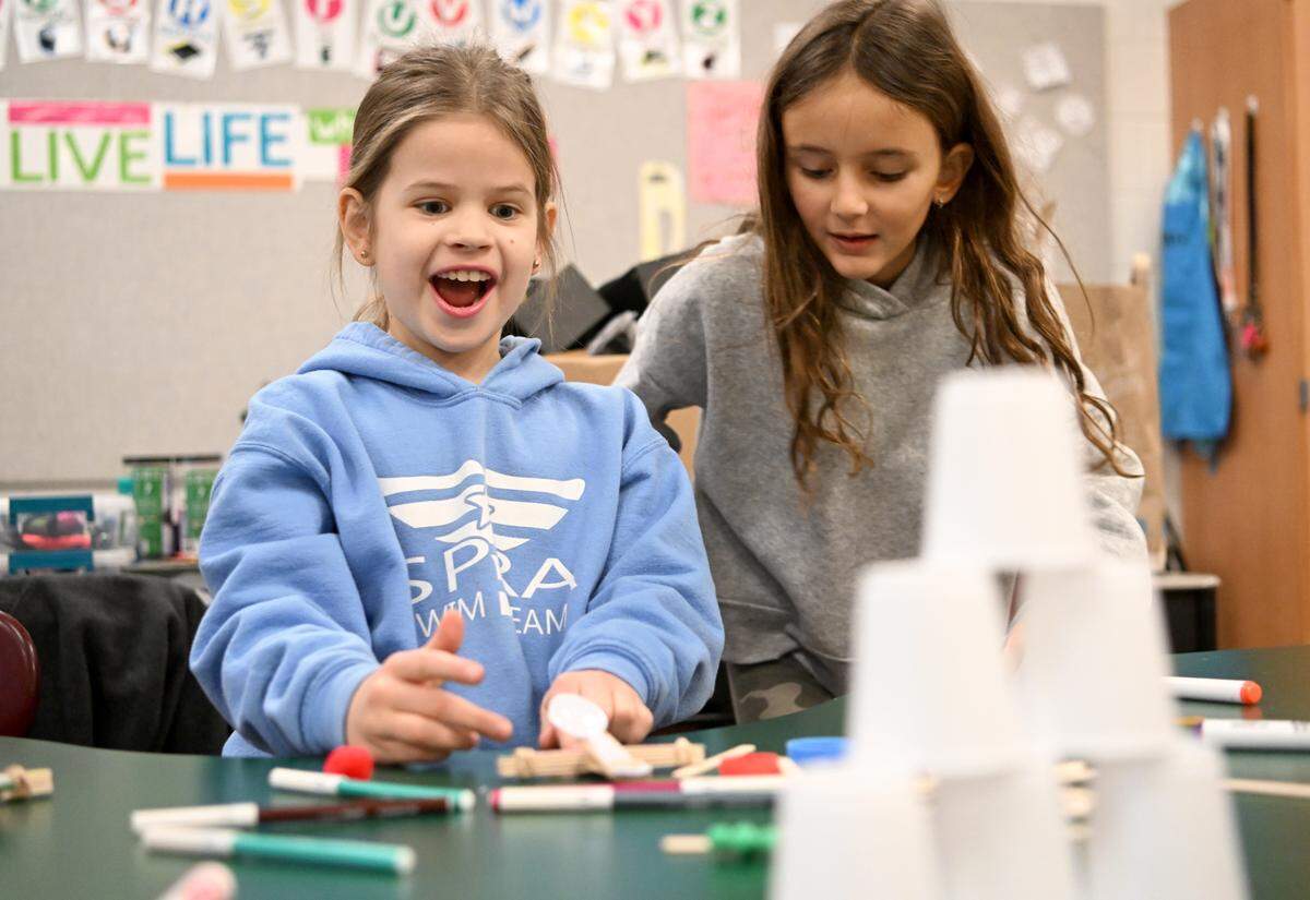 Third grader Lily Dubois reacts as she uses her catapult during STEM class at Park Forest Elementary on Thursday.