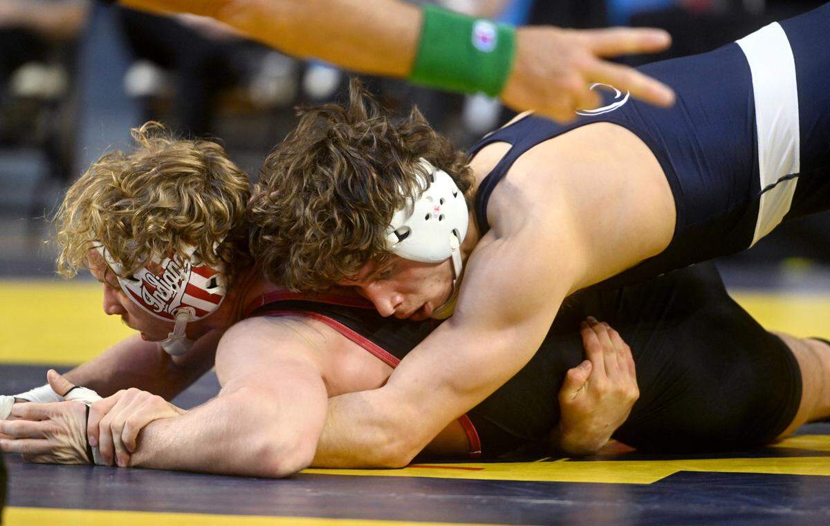 Penn State’s Levi Haines gets two point on Indiana’s Derek Gilcher in a 157 lb quarterfinal bout of the Big Ten wrestling championships at the Crisler Arena in Ann Arbor Michigan on Saturday, March 4, 2023.