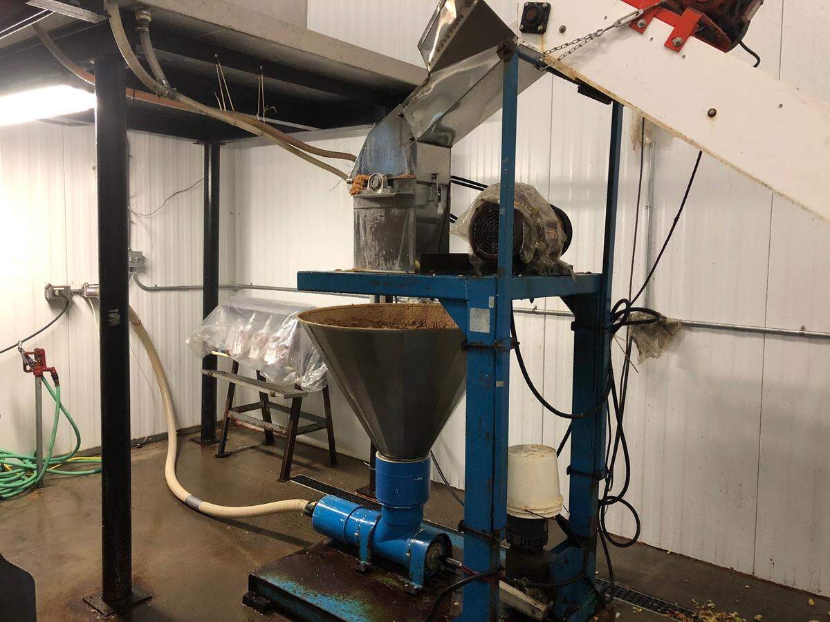 The apple cider press at Way Fruit Farm.