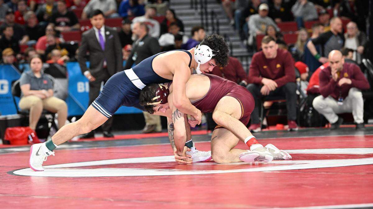 Penn State’s Beau Bartlett fights off a takedown attempt from Minnesota’s Michael Blockhus in their 149-pound Big Ten first round match on Saturday, March 5, 2022 in Lincoln, Neb. Bartlett edged Blockhus, 3-2.