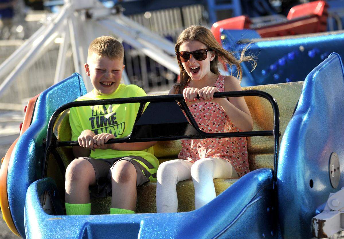 Lilly Lawrence and Braylan Covol ride the “Sizzler” at Boalsburg Fire Company carnival in 2015.