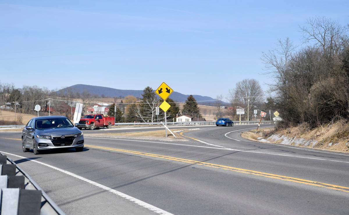Traffic travels through the intersection of Route 26 and Route 45 in Ferguson Township on Friday, March 4, 2022. Improvements to the intersection will include a traffic signal.