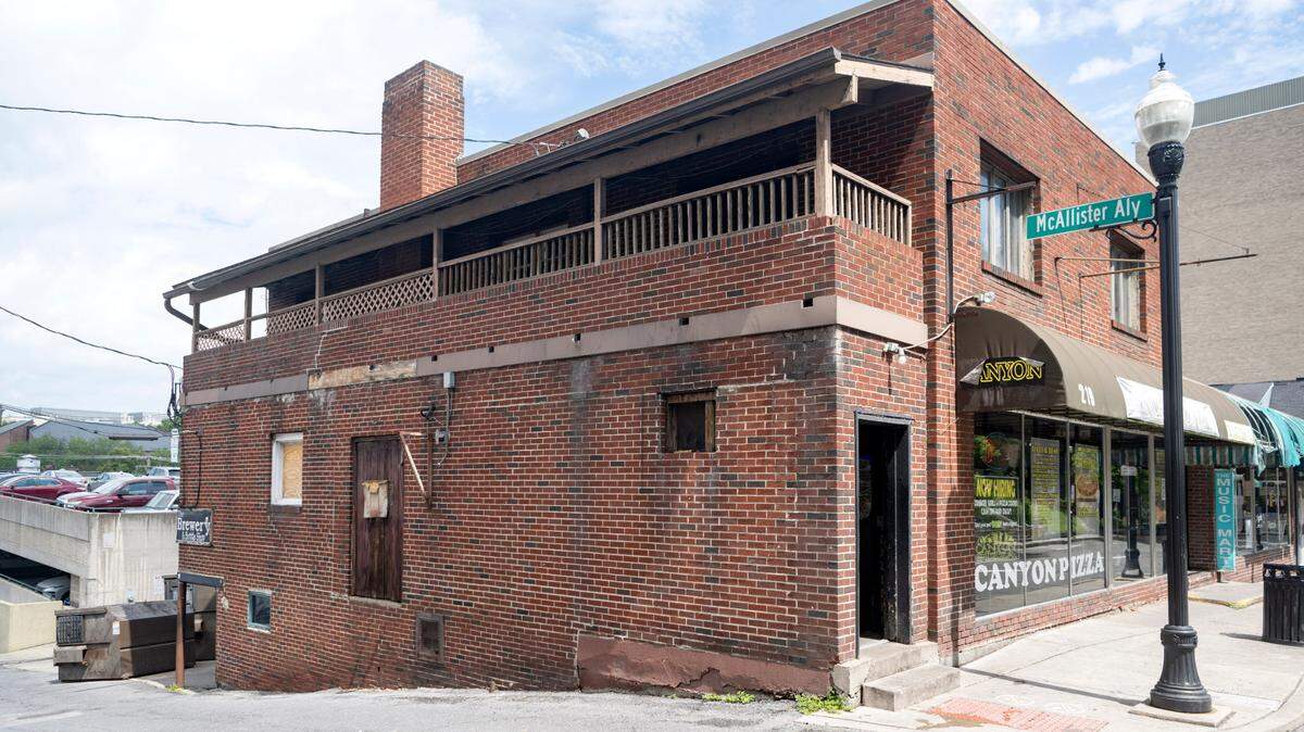 The building on the corner of McAllister Street and East Beaver Avenue that has Canyon Pizza and the Brewery in State College.