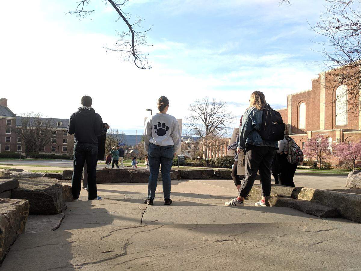 The group calling itself #WeAreNot staged a silent protest and die-in in front Penn State’s Lion Shrine on Saturday, ahead of the Blue-White Game. The group organized in the wake of the fatal officer-involved shooting of State College resident Osaze Osagie on March 20.
