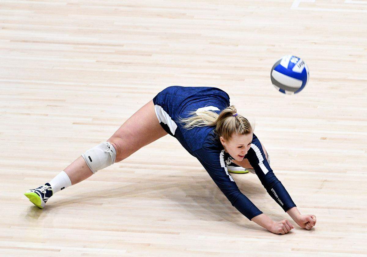 Penn State’s Kendall White stretches to return a shot during a Saturday’s NCAA second round match against Towson. Penn State defeated Towson, 3-1. (For the CDT/Steve Manuel)
