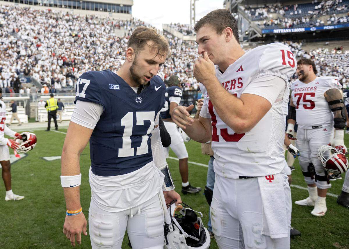 Penn State quarterback Ethan Grunkemeyer talks to Indiana quarterback Fernando Mendoza after the game on Saturday, Nov. 8, 2025.