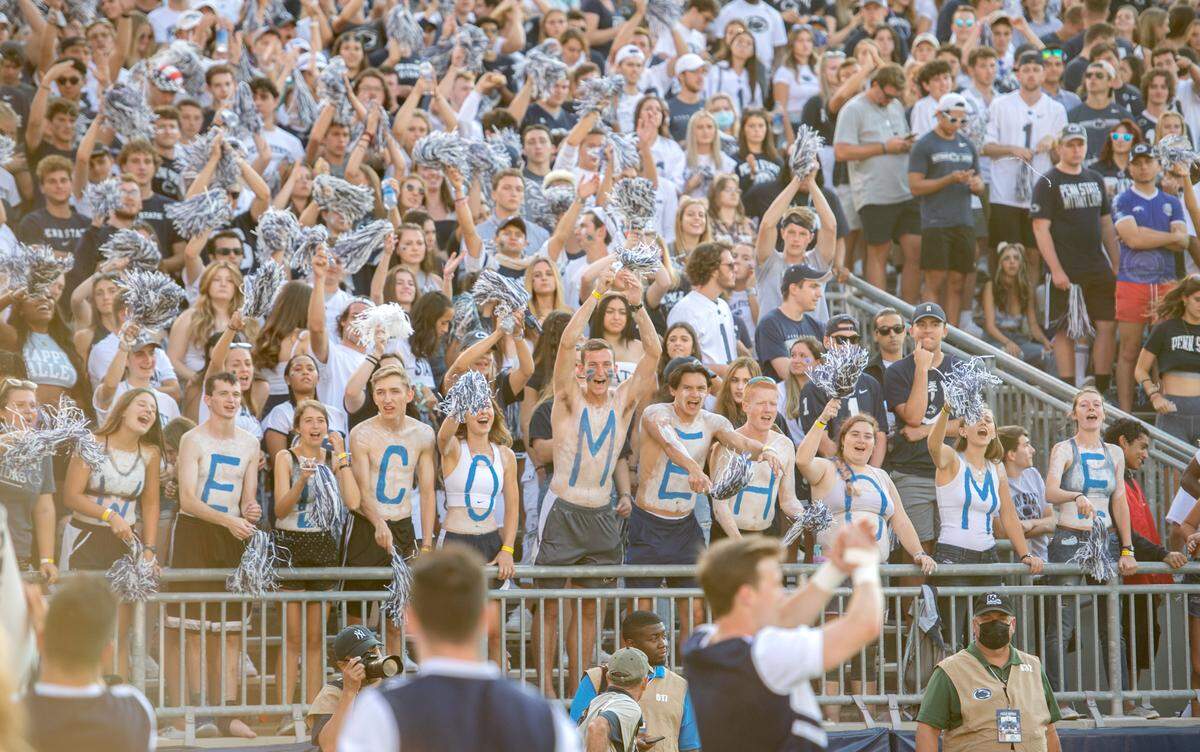 Fans cheer from the Penn State student section in Beaver Stadium during the football home opener against Ball State on Sept. 11.