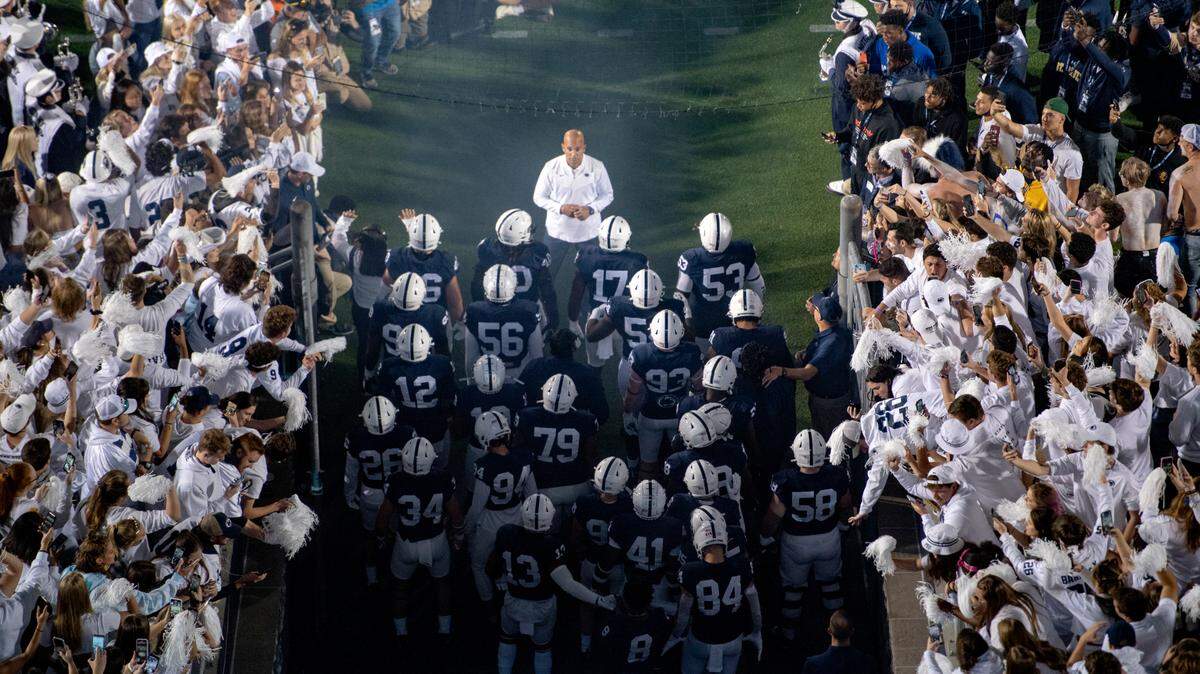 The student section cheers as Penn State football coach James Franklin faces his team before they run onto the field for the the game against Indiana at Beaver Stadium on Saturday, Oct. 2, 2021.