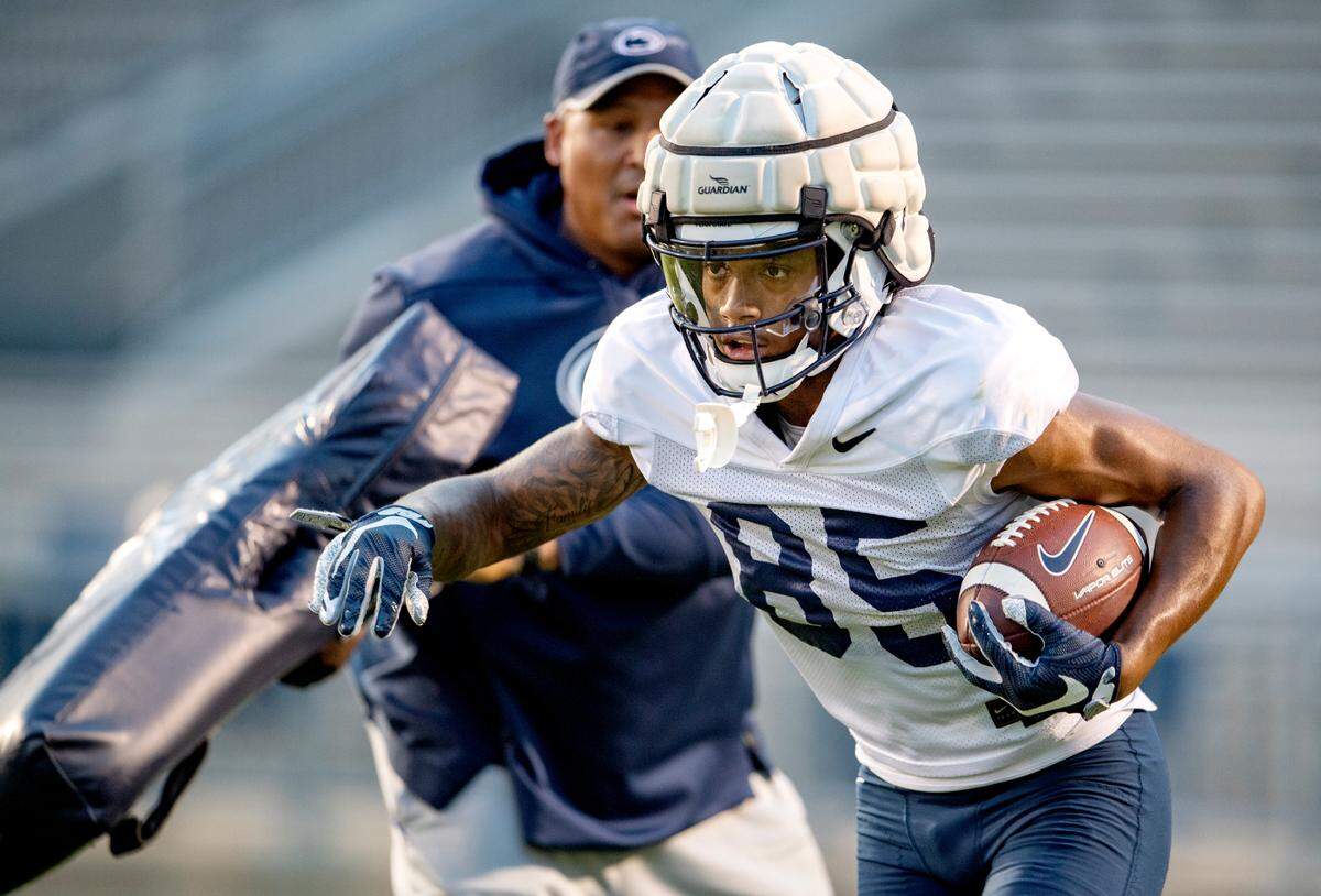 Penn State wide receiver Harrison Wallace III runs a drill during practice on Wednesday, Aug. 25, 2021 in Beaver Stadium.