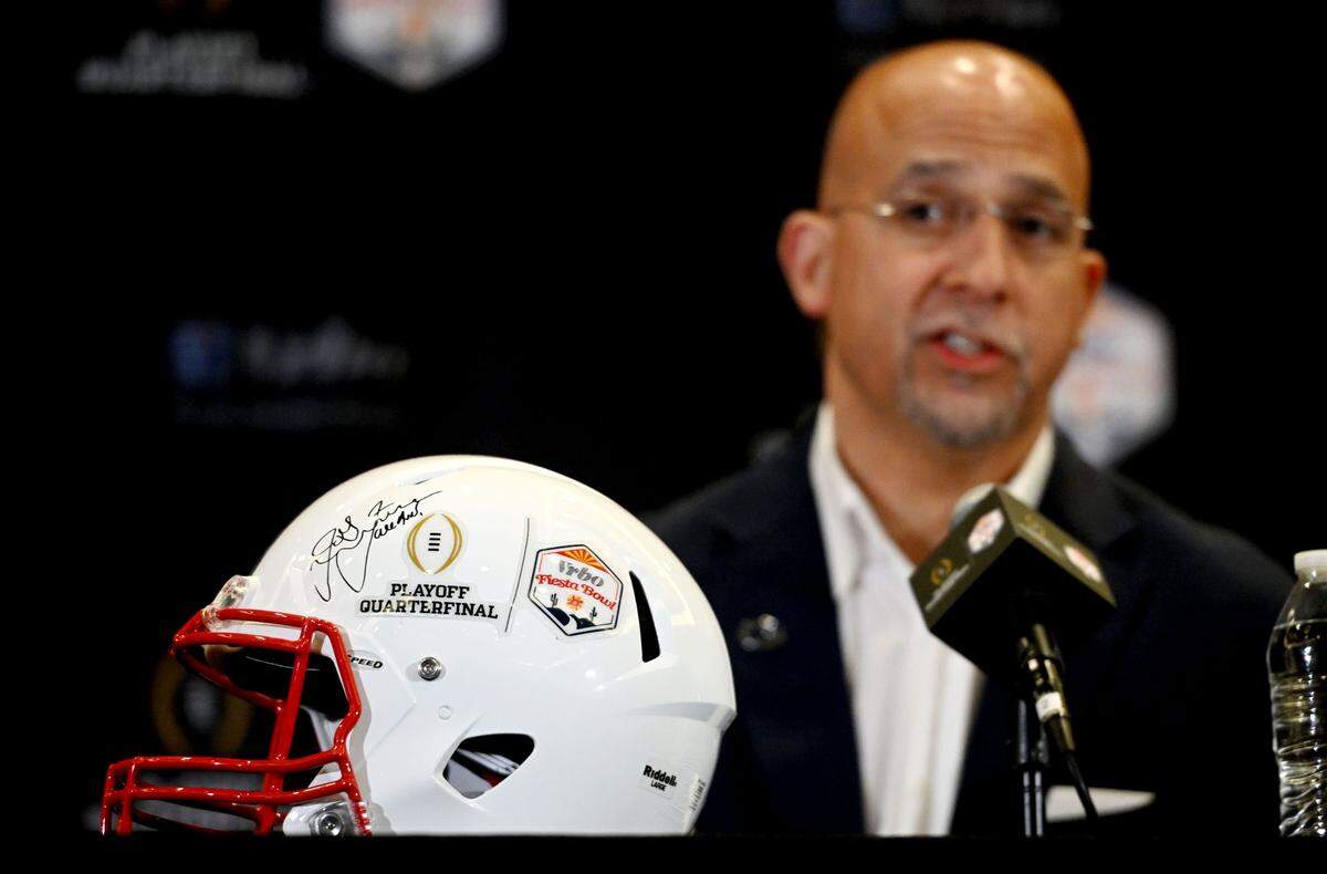 A signed helmet by Penn State football coach James Franklin with a College Football Playoff and Fiesta Bowl sticker during the Fiesta Bowl coaches press conference on Monday, Dec. 30, 2024 at the Camelback Inn.