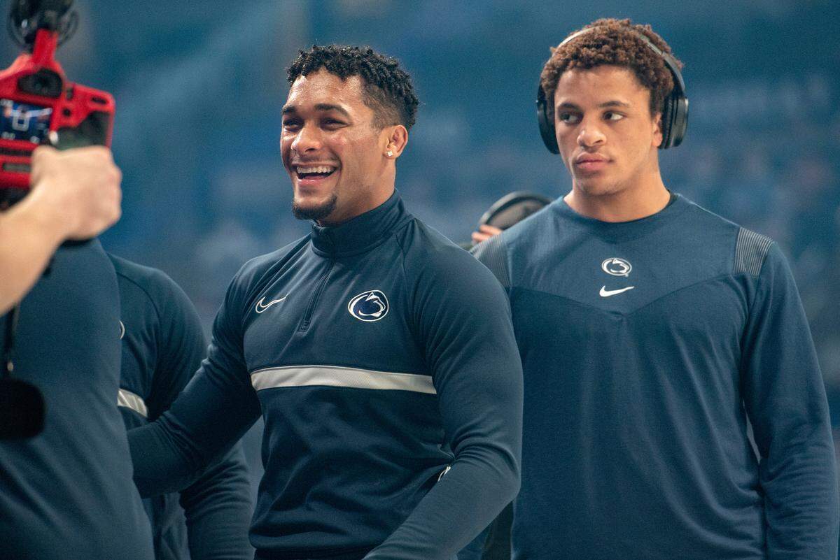 Penn State’s Carter Starocci laughs with this teammates as they are introduced for the match against Ohio State at the Bryce Jordan Center on Feb. 4, 2022. Starocci did not wrestle.