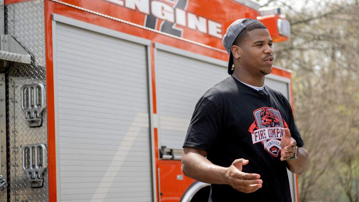 Penn State football player Abdul Carter talks about giving back to the community next to a fire truck from Woolrich Volunteer fire company on Friday, April 14, 2023. Nittany MinitMart and Pennsylvania Skill gathered local firefighters with Carter, along with teammate Curtis Jacobs and former Penn State and NFL linebacker LaVar Arrington to celebrate Fuel the Cause, a fundraiser for volunteer fire companies.