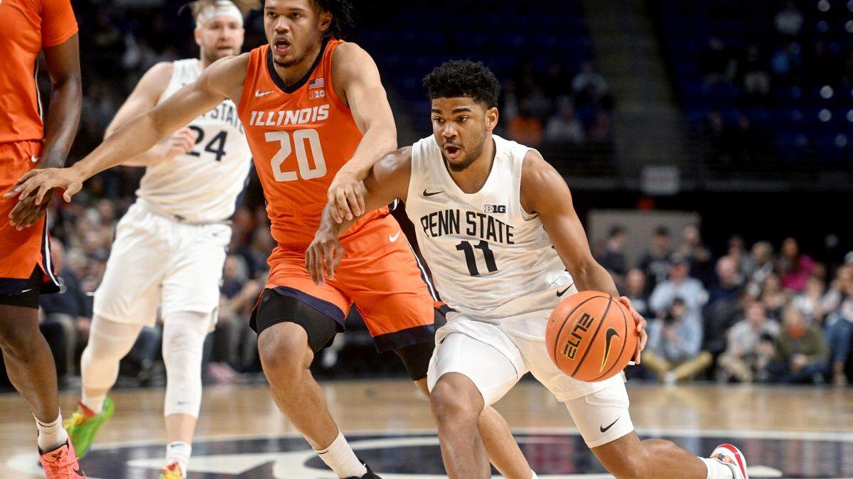 Penn State’s Camren Wynter dribbles around Illinois’ Ty Rodger during the game on Tuesday, Feb. 14, 2023.