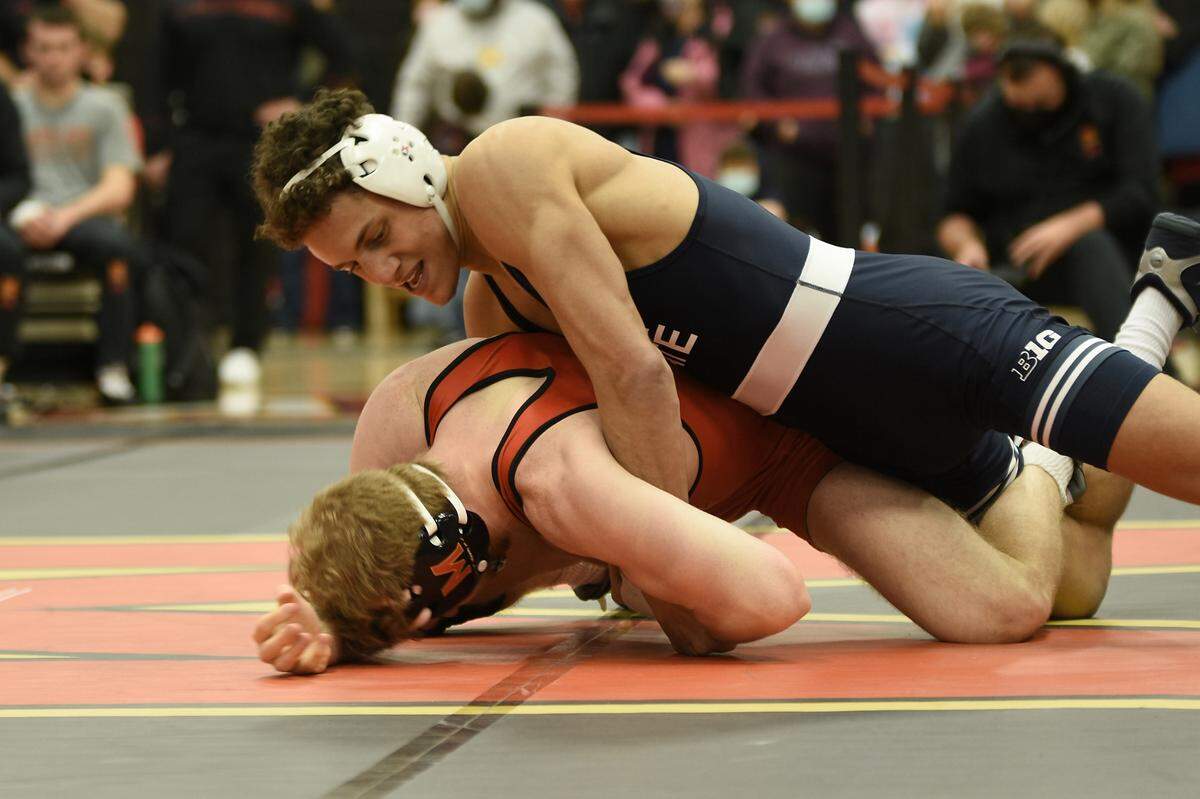Penn State’s Tony Negron controls Maryland’s Lucas Cordio in their 157-pound bout during the Nittany Lions’ 46-0 win on Jan. 7.
