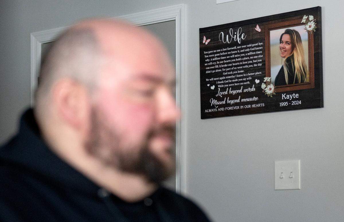 A photograph of Kayte Derhammer hangs on the wall as Walt Derhammer talks about the nonprofit he is creating, Koleton Cares, in honor of her and their son.