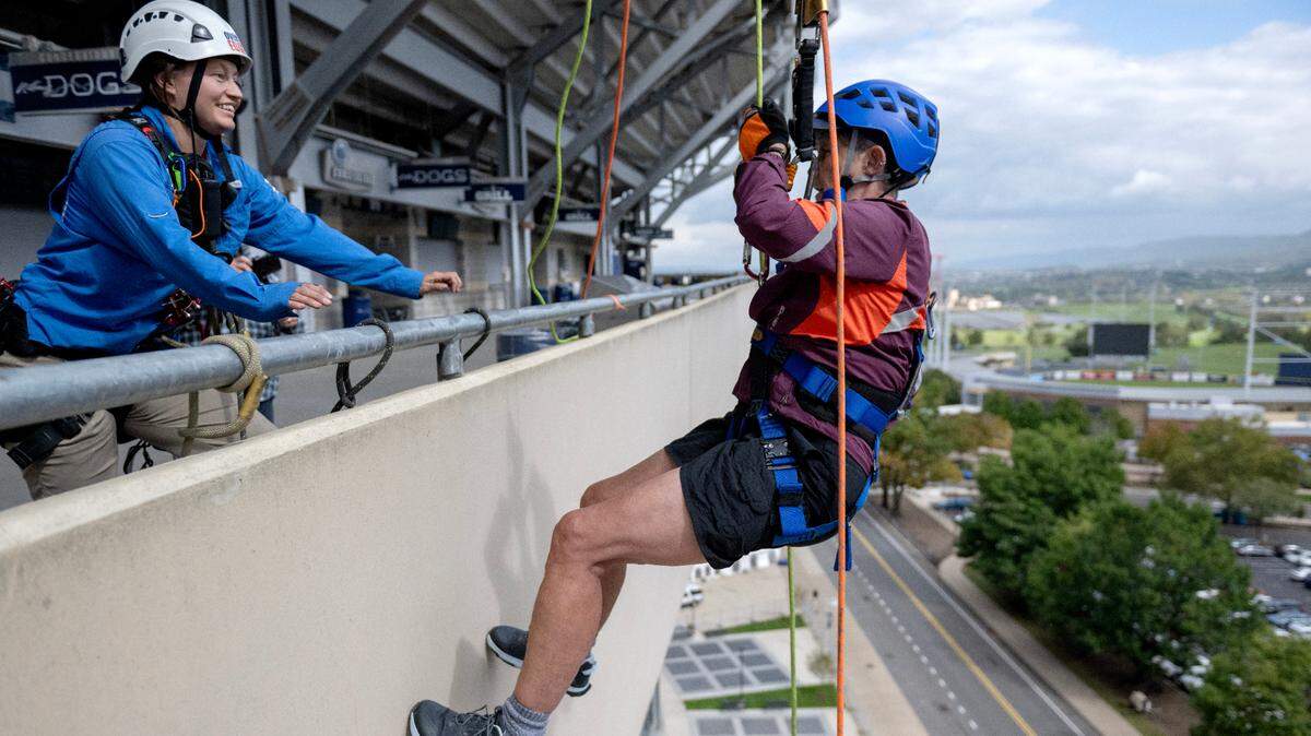 Dean Faye Chadwell, chair of the 2024 Penn State United Way campaign, goes Over the Edge at Beaver Stadium to support the Centre County United Way on Oct. 7.