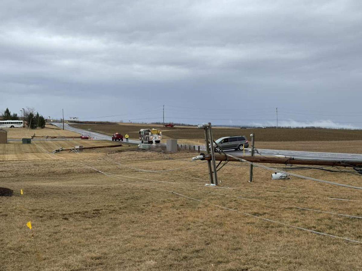 Downed power lines are pictured on Fillmore Road, near State College Regional Airport.