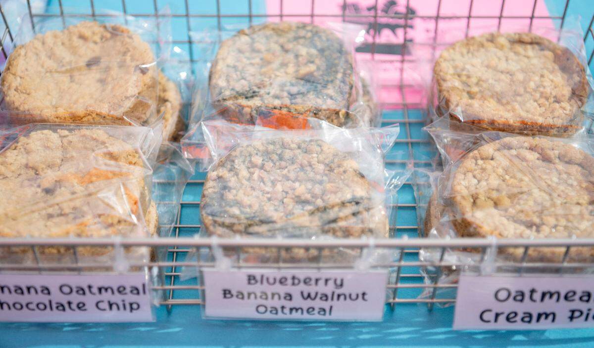 A sample of the cookies available from Inside Out Cookie including banana oatmeal chocolate chip, blueberry banana walnut oatmeal and oatmeal cream pie at the Pine Grove Mills Farmers Market on Thursday Aug. 25, 2022.