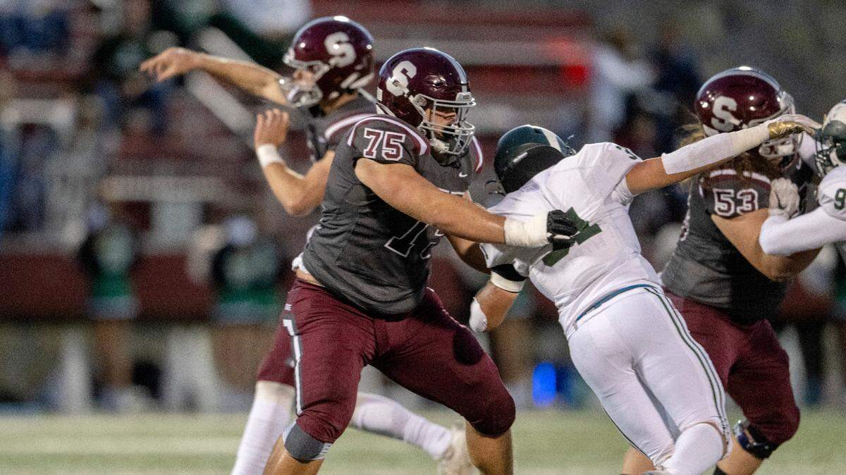 State College’s Michael Dincher blocks a Central Dauphin linebacker during the game on Friday, Sept. 23, 2022 at Memorial Field.