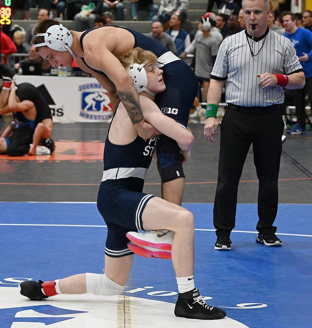 Penn State’s Braeden Davis looks to finish off a takedown of teammate Gary Steen in their final match of the day during the Journeymen Collegiate Classic on Sunday at Freedom High School in Bethlehem. Davis beat Steen, 11-3.