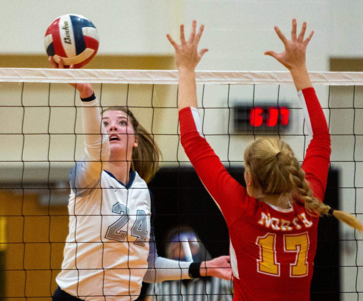 Philipsburg-Osceola’s Reese Hazelton (24) hits the ball during the PIAA Class 2A semifinal game against North Catholic High School in Cranberry Township on Tuesday, Nov. 17, 2020. The Lady Mounties defeated the Trojanettes 3-2 and will play in the state championship on Saturday.