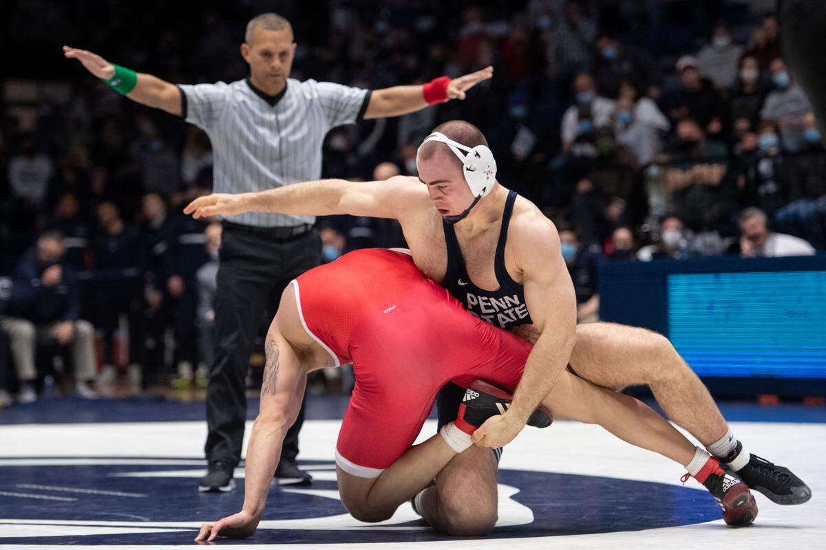 Penn State’s Max Dean grabs his opponent during a wrestling dual between Penn State and Rutgers on Sunday, Jan. 16, 2022 at Rec Hall in University Park, Pa. Penn State defeated the Scarlet Knights 27-11.