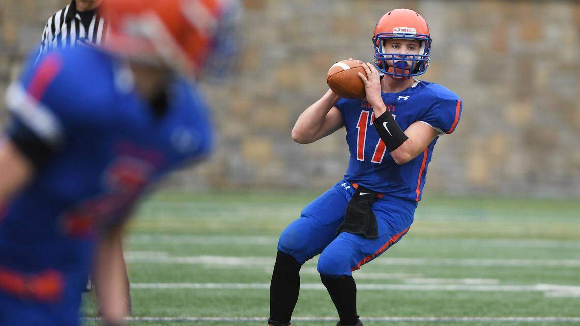 St. Joseph's Brendan Robinson looks down the field before throwing a pass during a game against Columbia Montour Vo-Tech Saturday, Oct. 14, 2017 at Memorial Field in State College. St. Joseph's has suspended its football program for the upcoming season due to a lack of participation.
