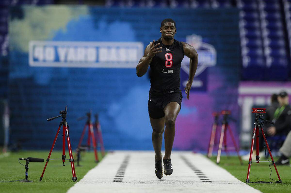 Penn State linebacker Cameron Brown runs the 40-yard dash at the NFL football scouting combine in Indianapolis, Saturday, Feb. 29, 2020. (AP Photo/Michael Conroy)