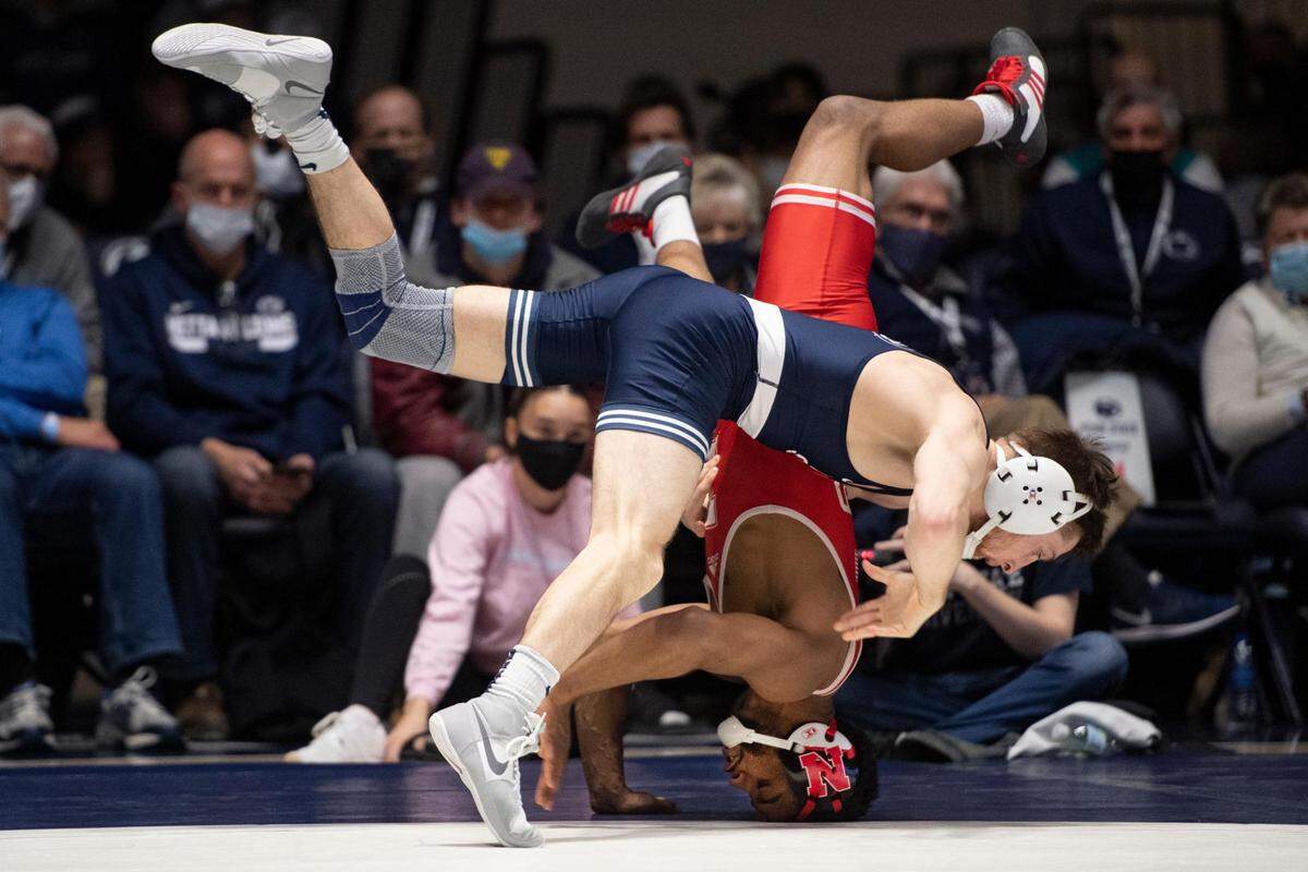 Penn State’s Nick Lee wrestles with Nebraska’s Chad Red Jr. during an NCAA wrestling dual between No. 1 Penn State and No. 8 Nebraska at Rec Hall on Sunday. Penn State defeated Nebraska 21-13 and claimed the Big Ten Regular Season Dual Meet Championship.