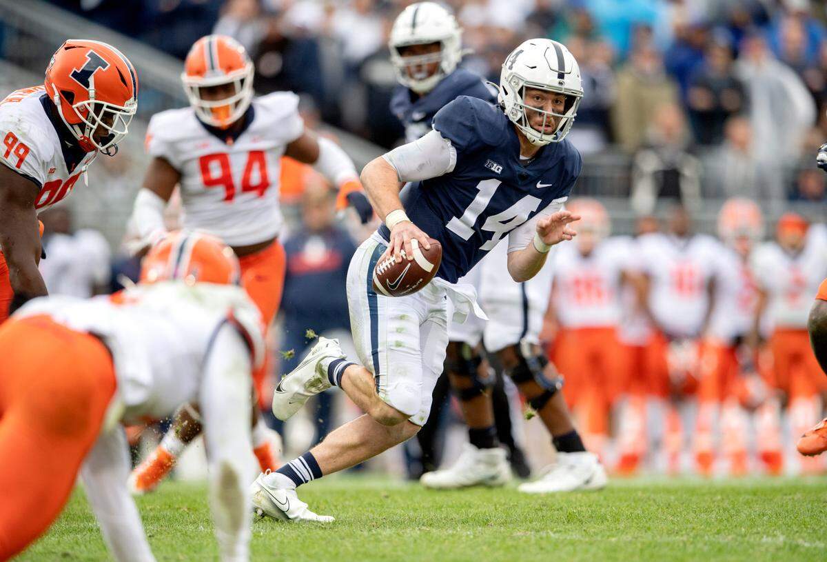 Penn State quarterback Sean Clifford scrambles during the first overtime of the game against Illinois on Saturday, Oct. 23, 2021.
