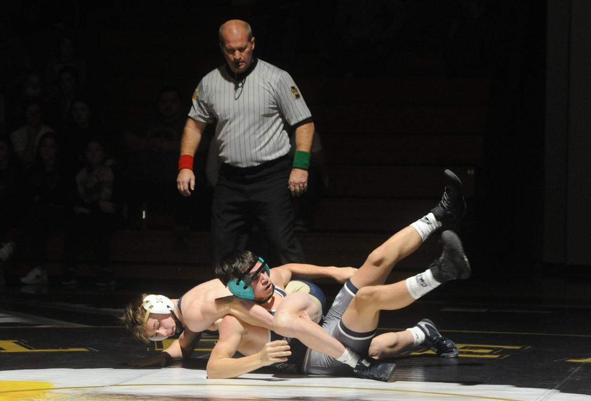 Bald Eagle Area’s Jeffre Pifer controls Philipsburg-Osceola’s Marcus Gable during their 138-pound bout during the Eagles’ 47-15 win on Thursday, Jan. 6, 2022. Pfier topped Gable, 6-3, in a highly anticipated matchup.