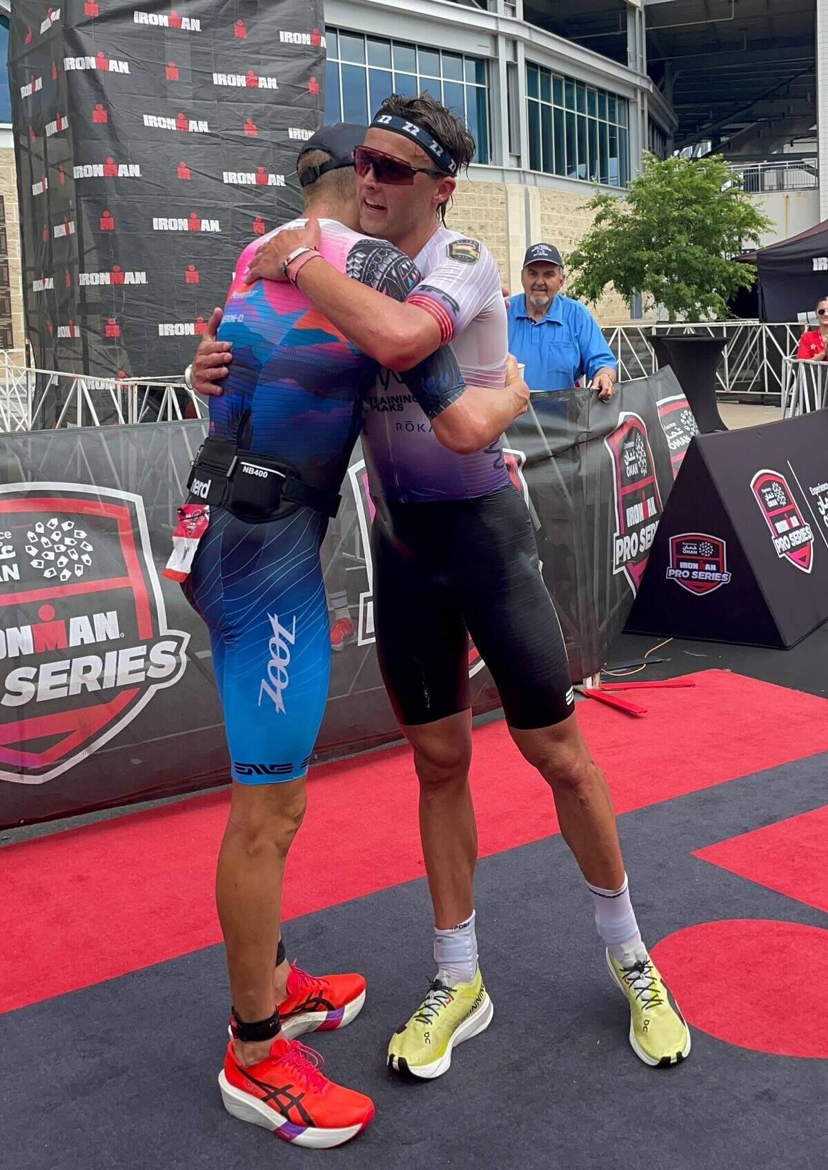 Top finishers Trevor Foley and Sam Long congratulate each other Sunday, June 14, 2026, at the Ironman 70.3 Pennsylvania Happy Valley North American Championship in Centre and Clinton counties.