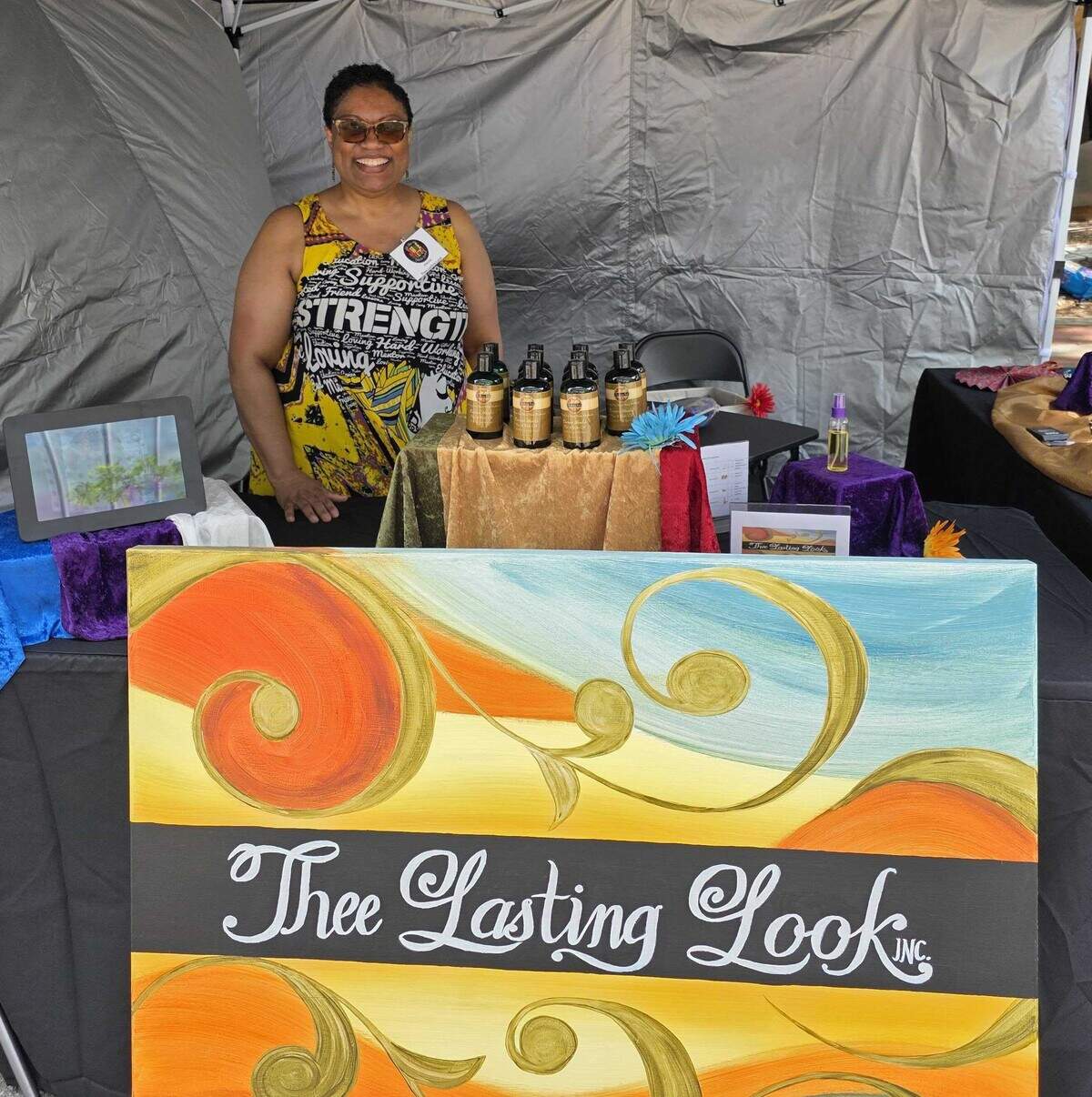 Darchelle Ross, owner of Thee Lasting Look, a small business that specializes in hair and body essential oils, tabled at State College’s 7th annual Juneteenth Block Party by selling her homemade products, as well as authentic African fans she received from a friend in Ghana.