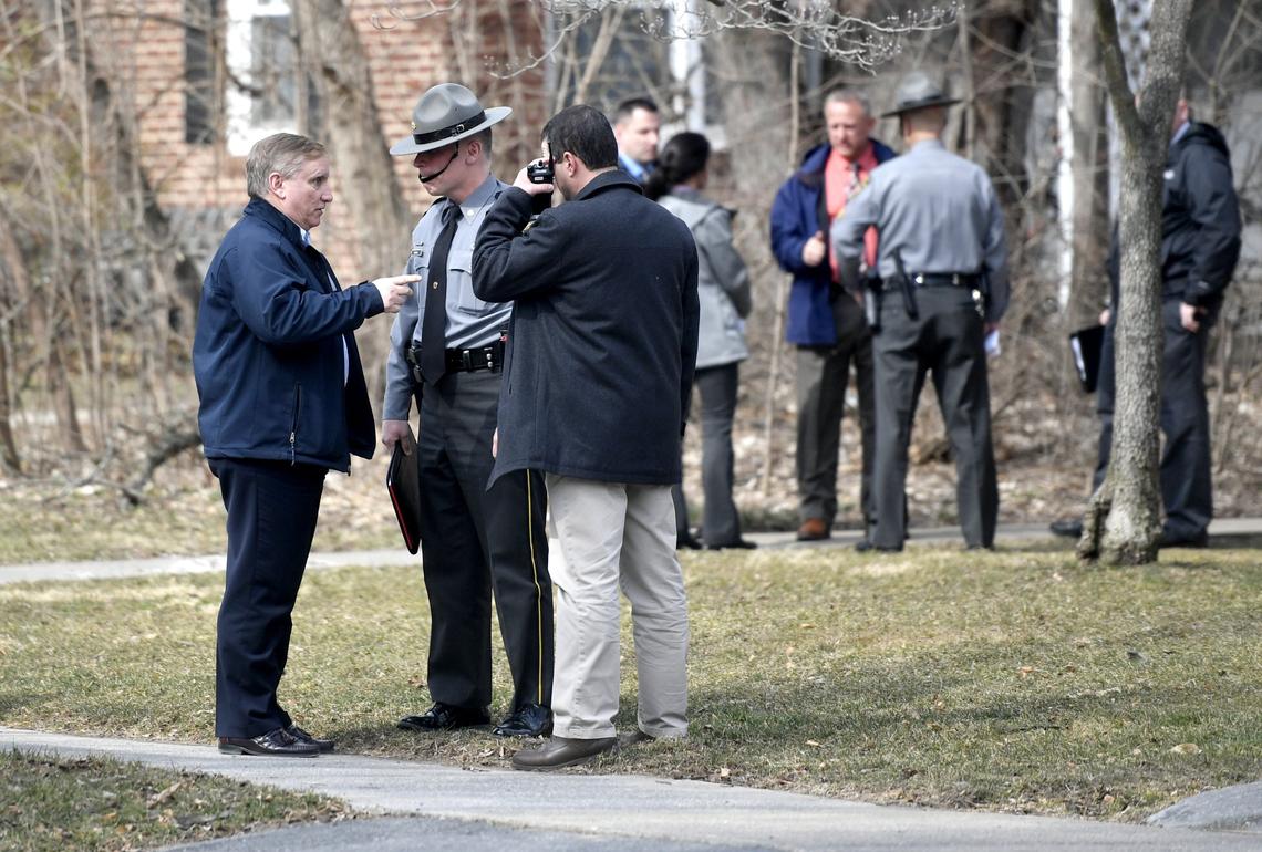 State College police chief John Gardner talks to Pennsylvania State Police and Lt. Greg Brauser as an investigation occurs at Marvin Gardens apartment after a police involved shooting on Wednesday, March 20, 2019.