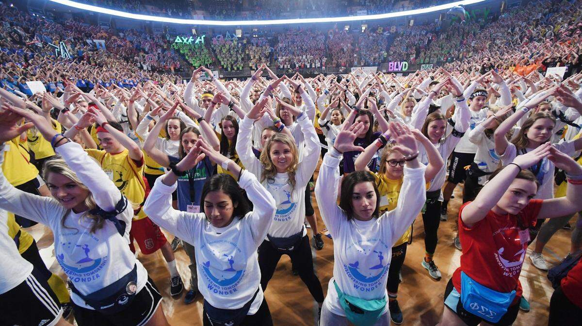 The crowd learns the 2018 dance during Day 1 of Thon on Feb. 16, 2018, at the Bryce Jordan Center. Next year’s dance marathon will again be held at the BJC and in-person.