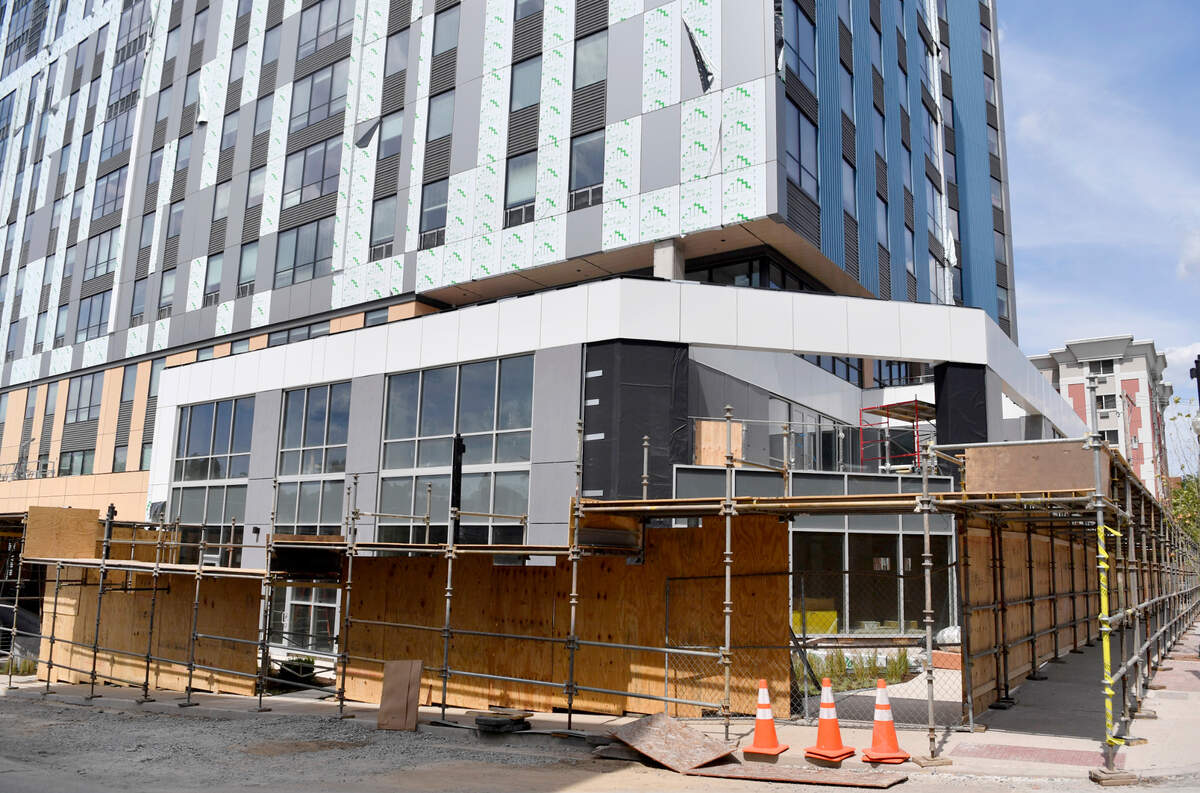Scaffolding and construction equipment still surrounds Here State College on Friday, Aug. 21, 2020, the day tenant leases were to start.