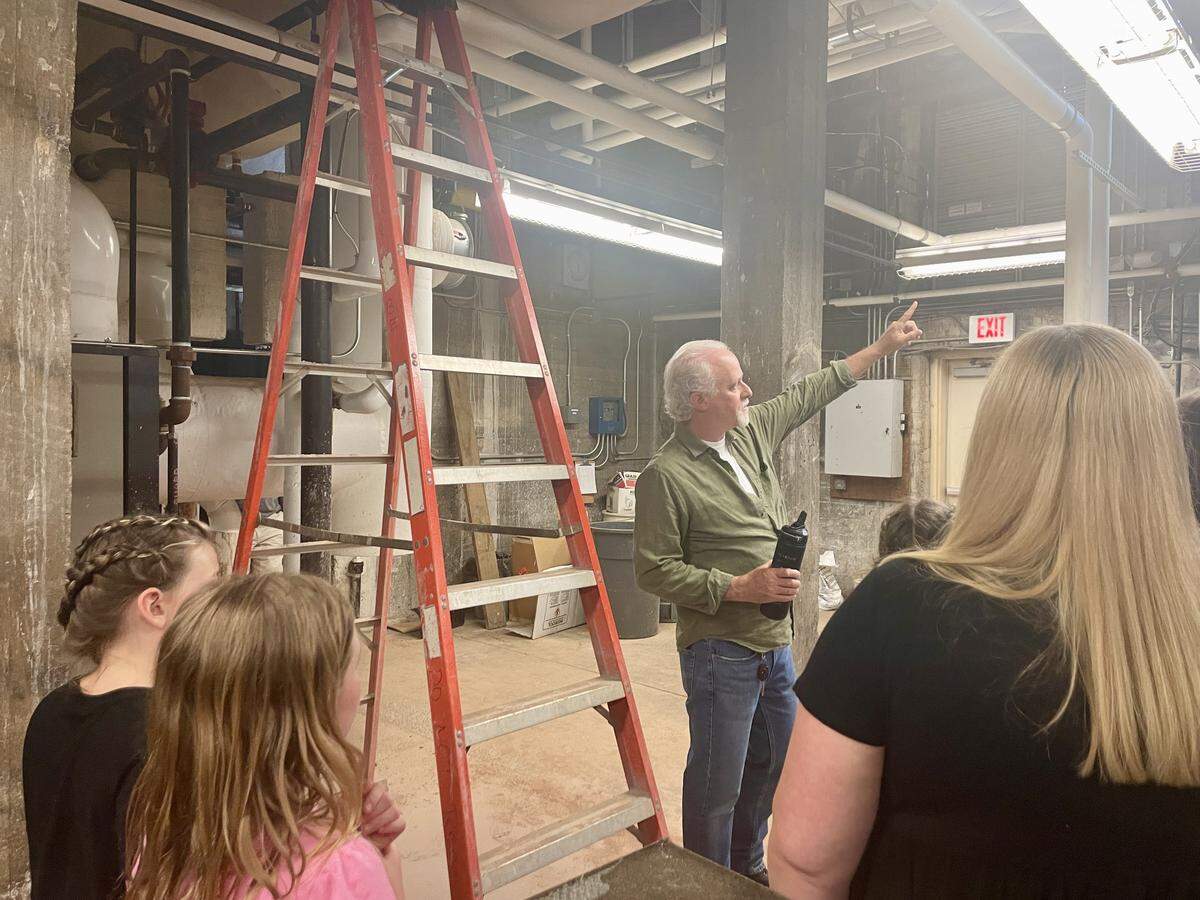 Retired teacher Steve Klein leads a guided behind-the-scenes tour in Bellefonte Elementary’s boiler room on May 21, 2026.