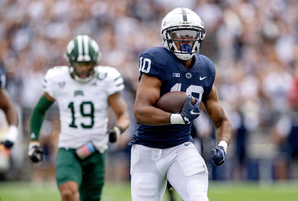 Penn State running back Nick Singleton runs down the field for a touchdown during the game against Ohio on Saturday, Sept. 10, 2022.