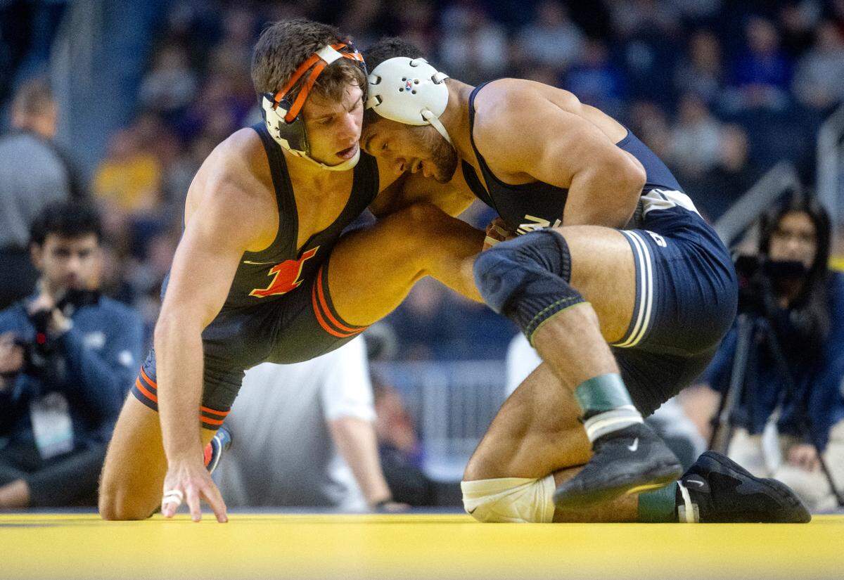 Illinois’ Jake Harrier and Penn State’s Shayne Van Ness wrestling in a 149 lb bout in the first round of the Big Ten wrestling championships at the Crisler Arena in Ann Arbor Michigan on Saturday, March 4, 2023.
