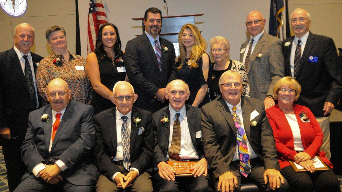 Members of the 2021 class of the Centre County Chapter of the of the Pennsylvania Sports Hall of Fame were honored Sunday at the Penn Stater Hotel. Pictured, in the front row, from left, are: Bucky Quici, Gene Dixon, Keno Beezer and John Wetzler and Mary Wetzler (for BJ Wetzler). In the second row, from left, are: Bob Baumbach for Jackson Horner, Beth Devlin-Keune, Angela Hoover, Eric Milton, Tanya Dinges Allen for Max Dinges, Bernie Fornicola for Larry Fornicola, Dave Joyner and Ron Pifer.