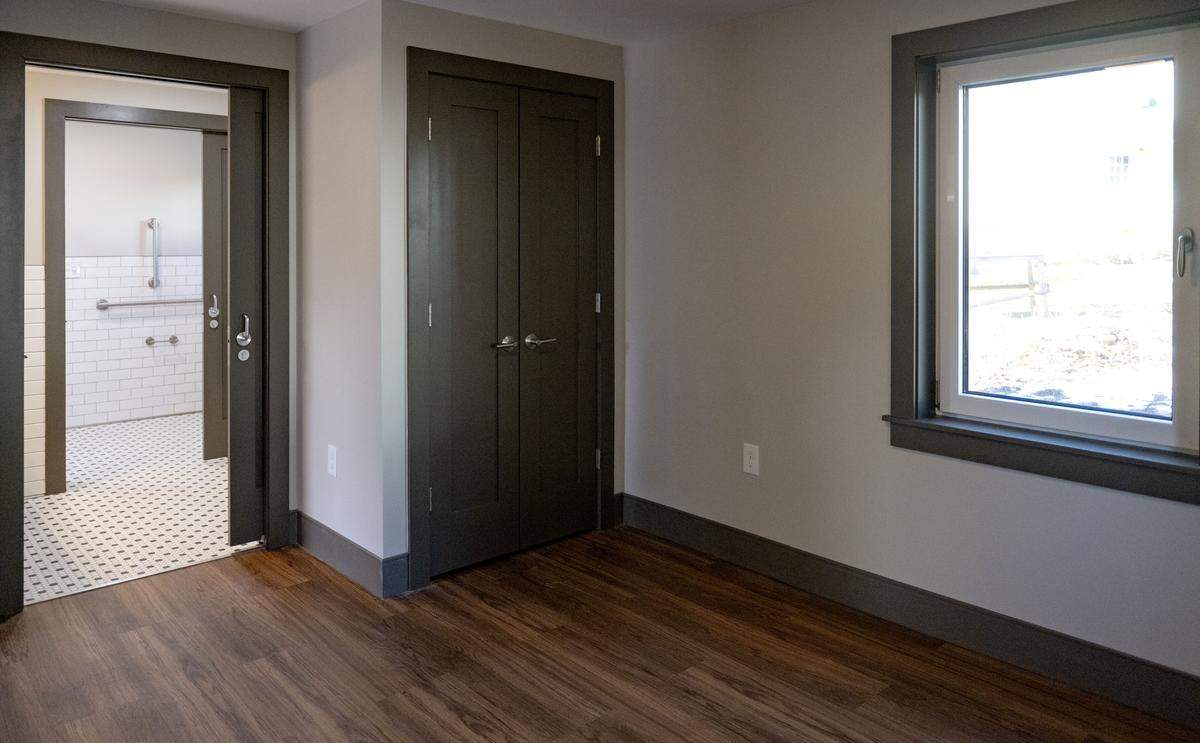 The bedroom into the laundry area and bathroom in the ADA accessible apartment at the Old Boalsburg Road Flats in State College. The energy efficient apartments were a collaboration between the State College Borough, the State College Community Land Trust and the HOME Foundation. 