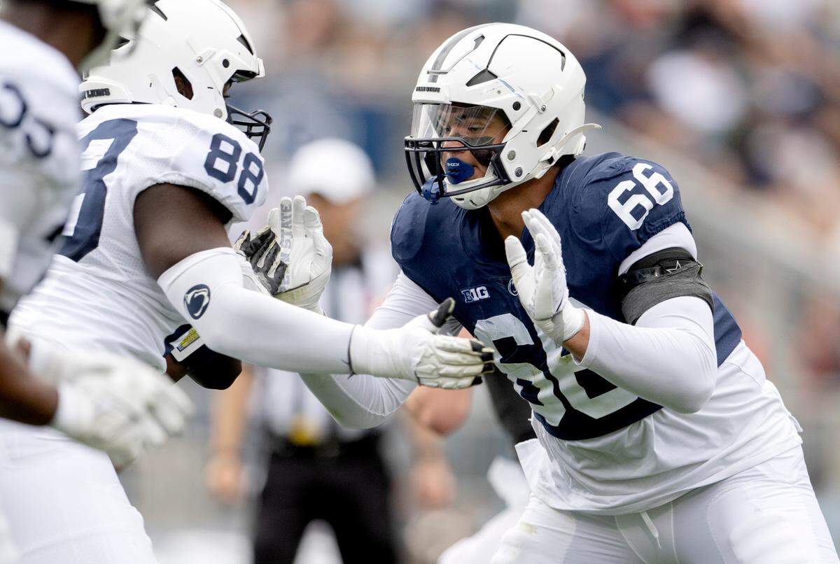 Offfensive lineman Drew Shelton blocks during the Penn State Blue-White game on Saturday, April 15, 2023.